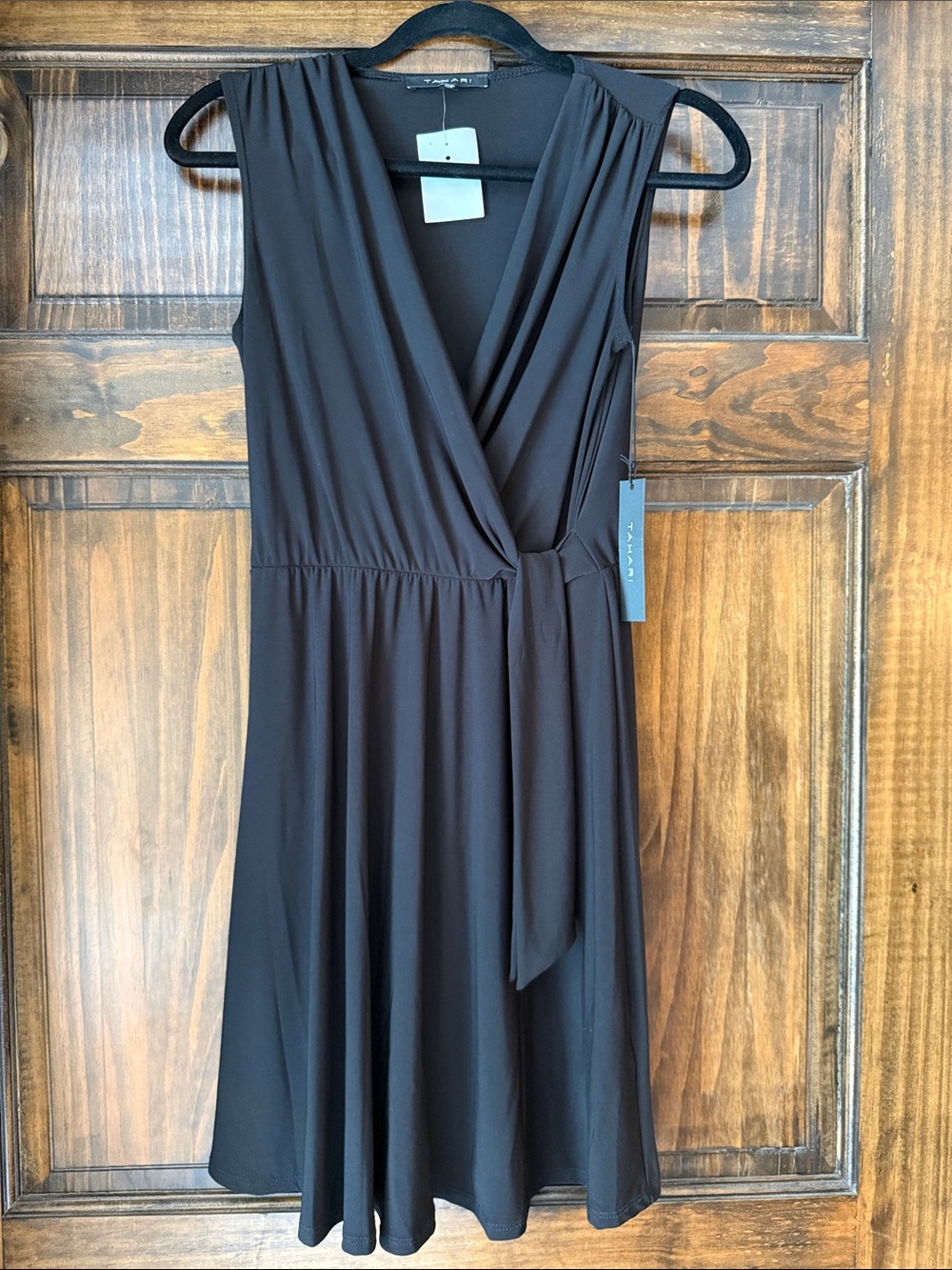 NWT black stretchy wrap dress